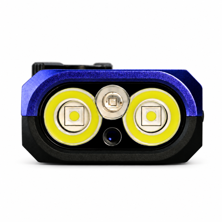 Close-up of the ACEBEAM UC25 SFT25R flashlight head with LED emitters, blue and black anodized body
