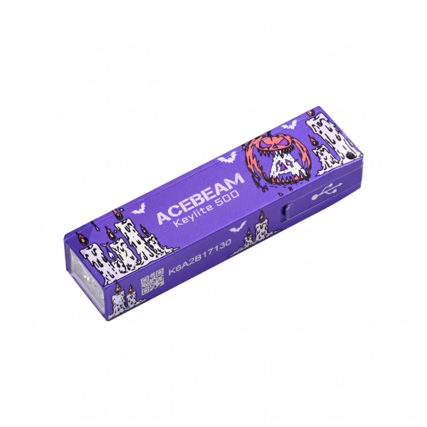 ACEBEAM Keylite 500 compact keychain light, purple Halloween edition with USB port, angled view